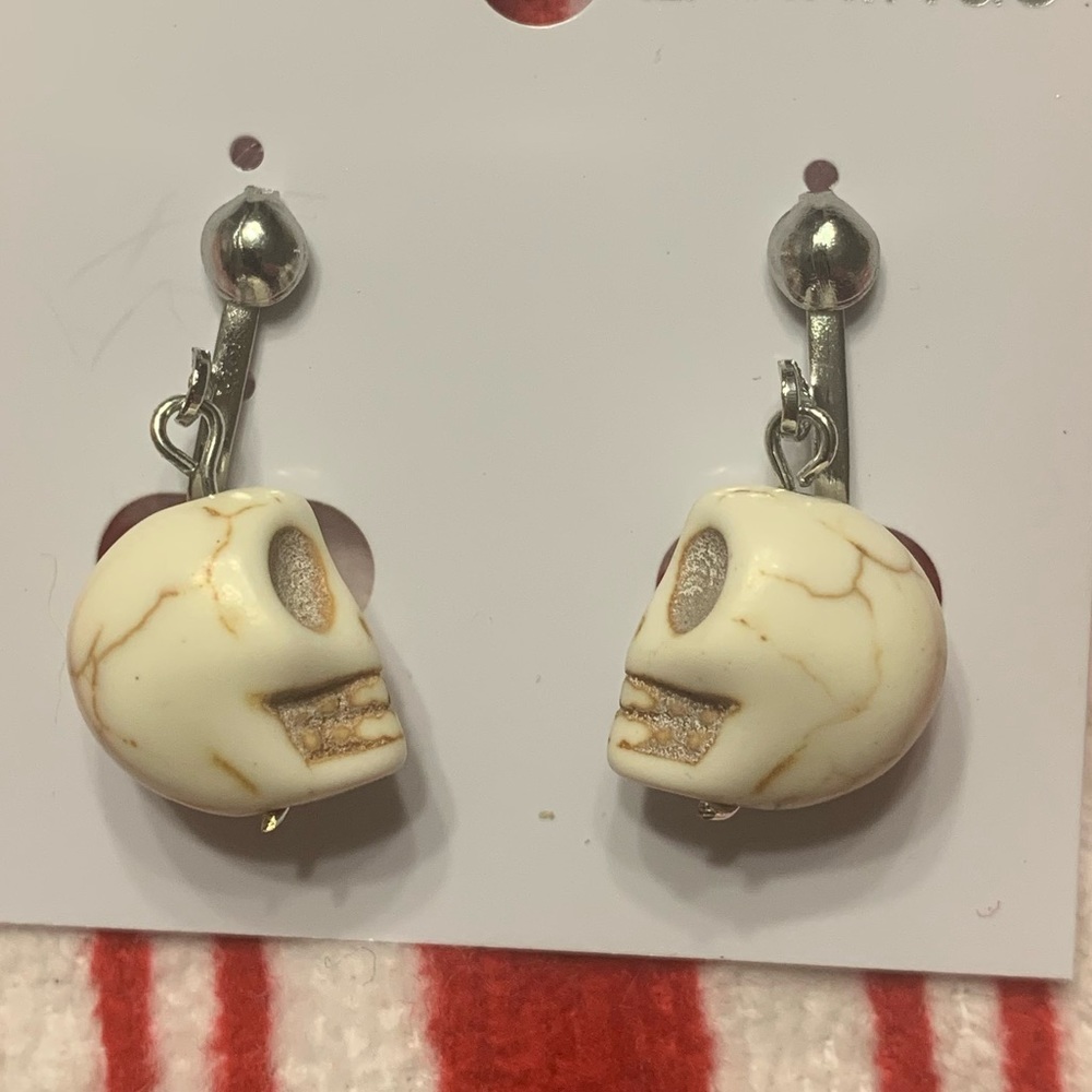 Clip on skull earrings